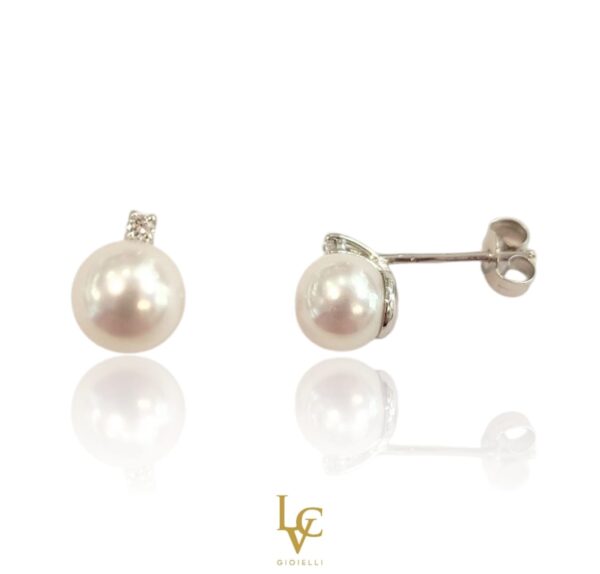 Orecchini con perla e punto luce