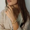 Bracciale Mignon con saponette satinate e pietre ovali sui toni del verde - immagine 2